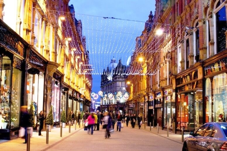 busy street with hanging lights